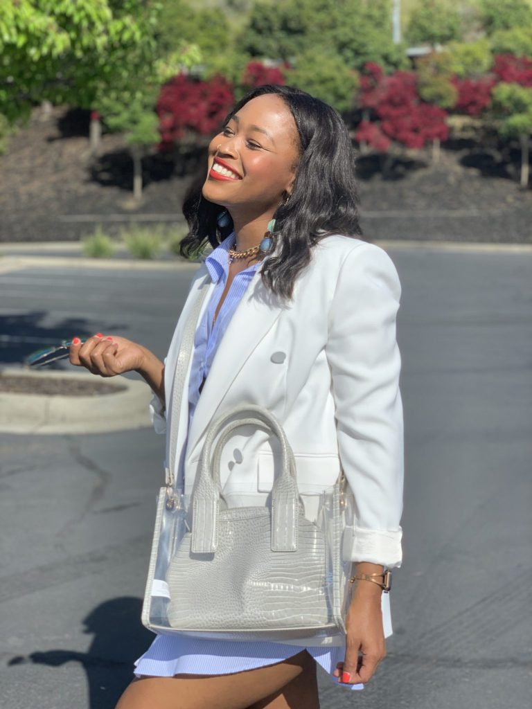 Blogger Steffanie Monae is wearing a white double breasted oversized zara blazer. It is paired with a Zara shirt dress and Adidas Yeezy Boost 700.