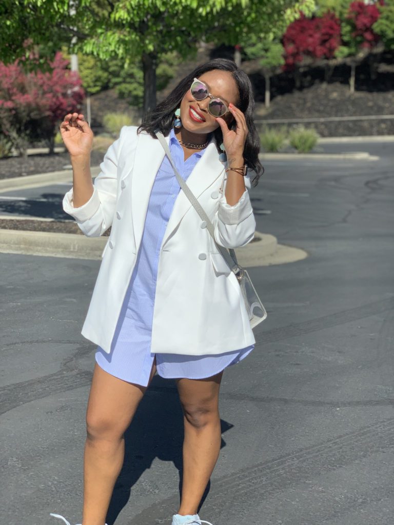 Blogger Steffanie Monae is wearing a white double breasted oversized zara blazer. It is paired with a Zara shirt dress and Adidas Yeezy Boost 700.