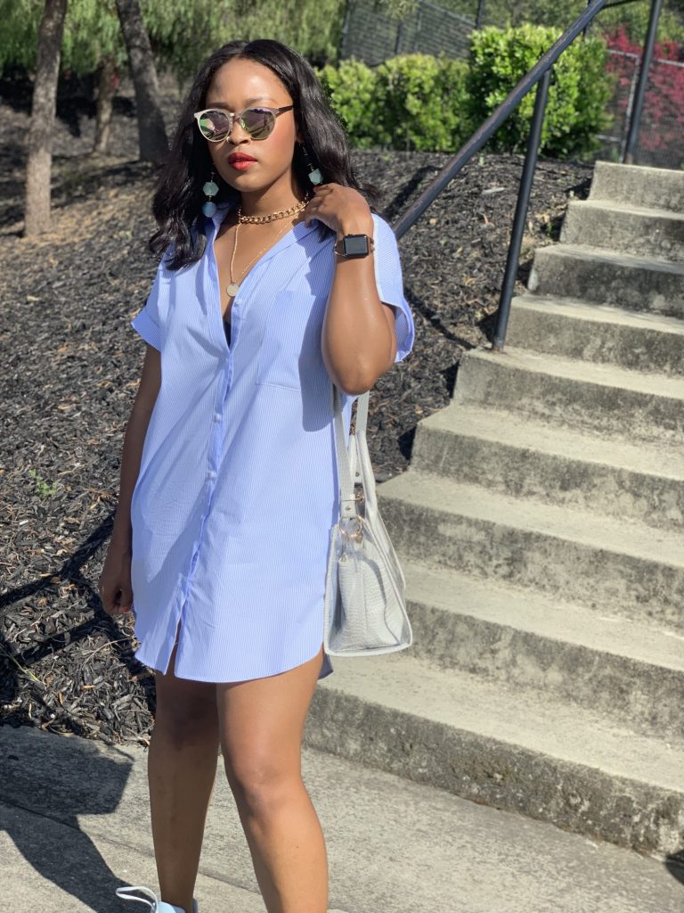 Blogger Steffanie Monae is wearing a white double breasted oversized zara blazer. It is paired with a Zara shirt dress and Adidas Yeezy Boost 700.