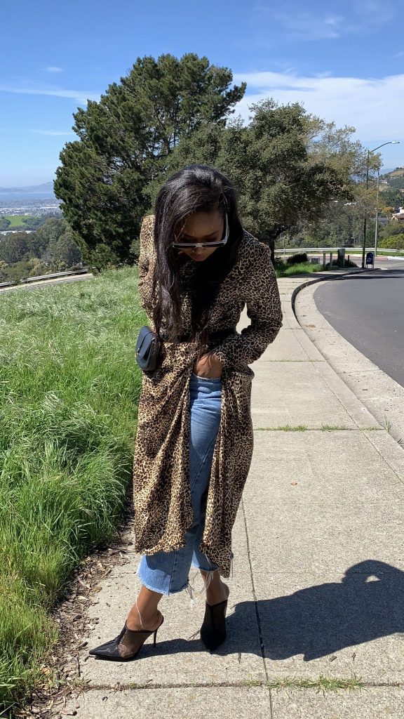 Wear Your Favorite Dress With Denim Pants This Mothers Day. Wearing Topshop split animal printed dress, Topshop straight leg denim, and Zara mule. 