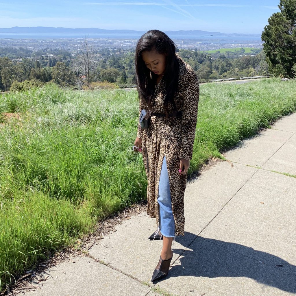 Wear Your Favorite Dress With Denim Pants This Mothers Day. Wearing Topshop split animal printed dress, Topshop straight leg denim, and Zara mule. 