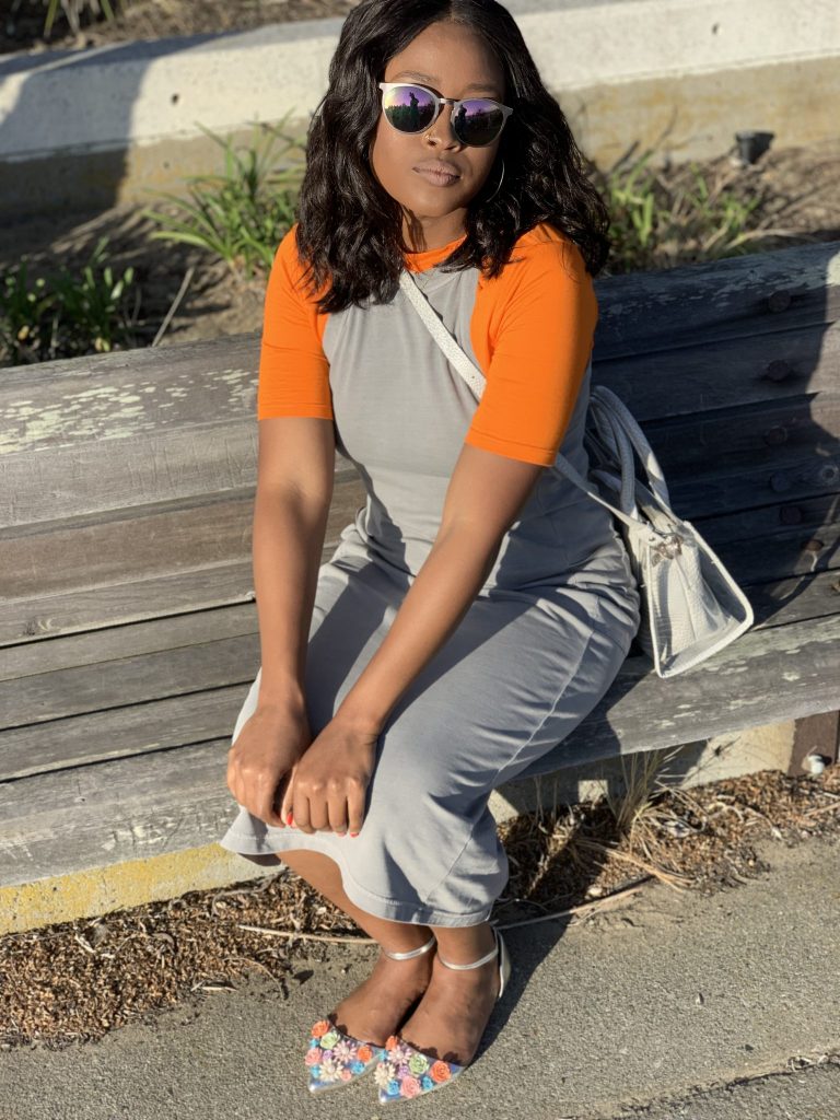 Refill and Refresh from fashion and lifestyle blog Steffanie Monae at steffaniemonae.com. Wearing a Nordstrom Midi dress, Asos Women top, Asos floral flats, Zara Women city bag and target headband. 