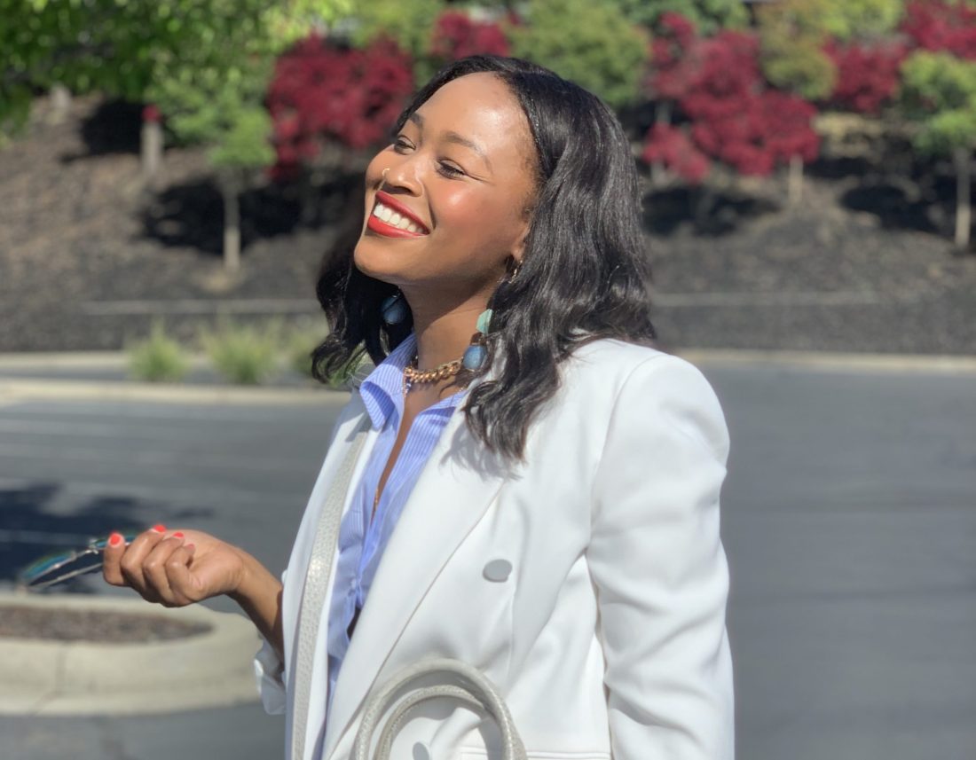 Blogger Steffanie Monae is wearing a white double breasted oversized zara blazer. It is paired with a Zara shirt dress and Adidas Yeezy Boost 700.
