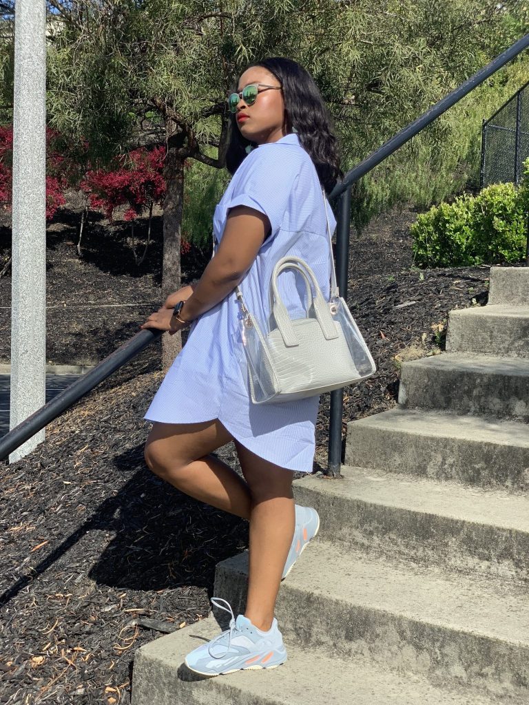 Blogger Steffanie Monae is wearing a white double breasted oversized zara blazer. It is paired with a Zara shirt dress and Adidas Yeezy Boost 700.