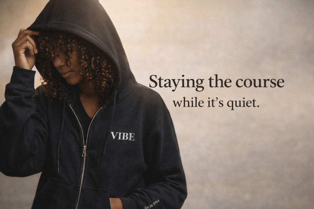 Staying the course while it’s quiet blog cover featuring a woman wearing a black VIBE zip hoodie, representing encouragement, patience, and personal growth during quiet seasons.
