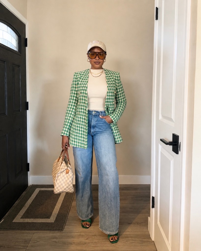 black women standing wearing a statement blazer